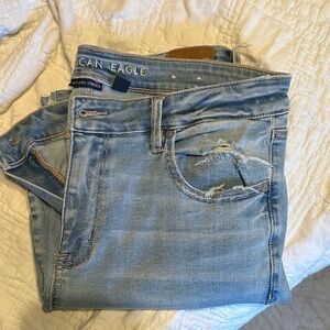 Kick Boot Cropped Light Blue Distressed Jeans